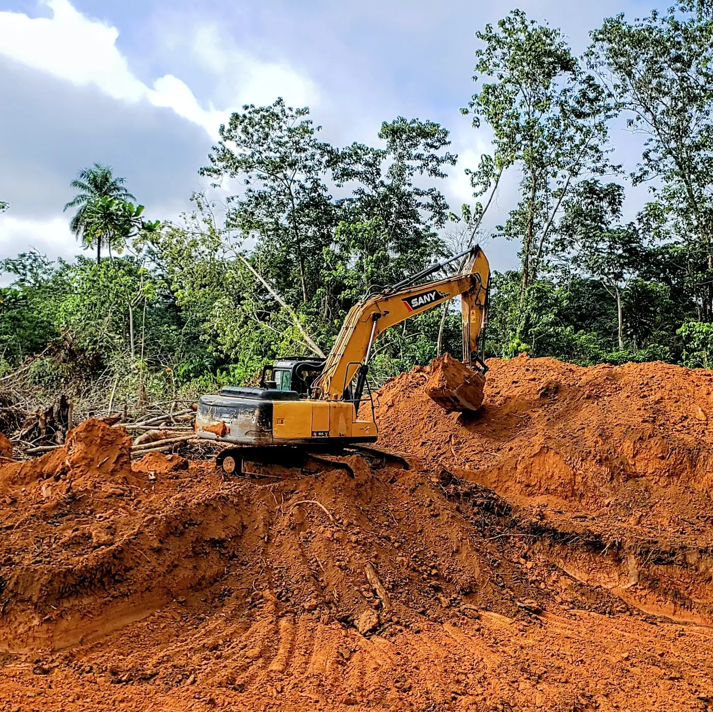 Excavator working a placer cut